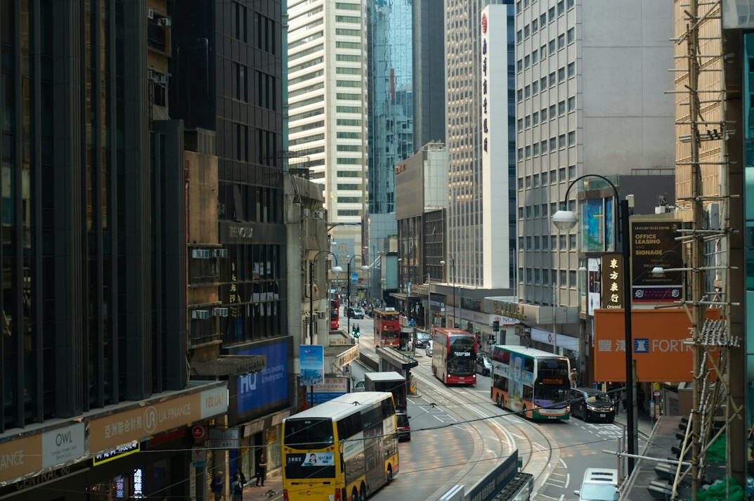 Busy city street with traffic and buses